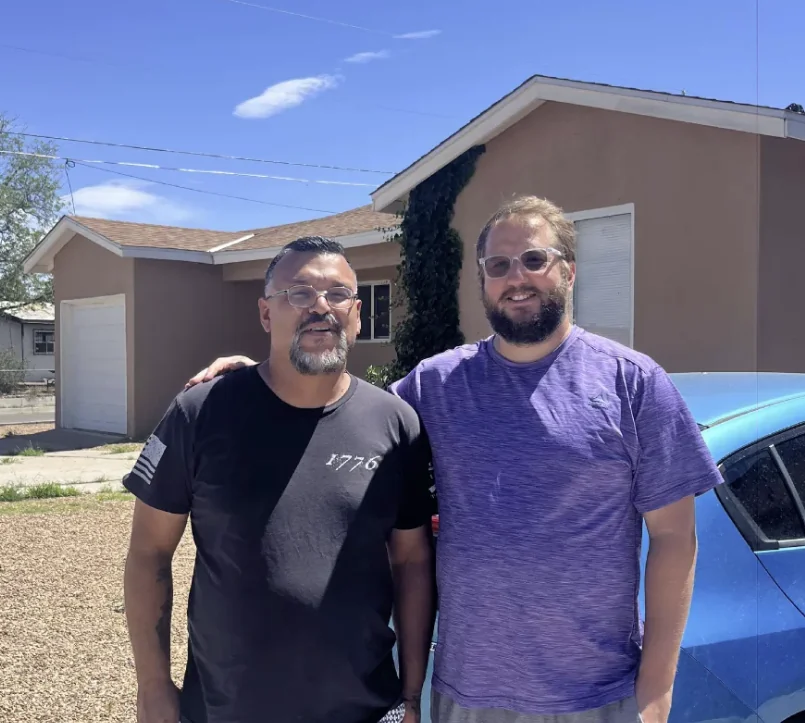 James and Victor, the founders of Oolong Water, standing together in Albuquerque